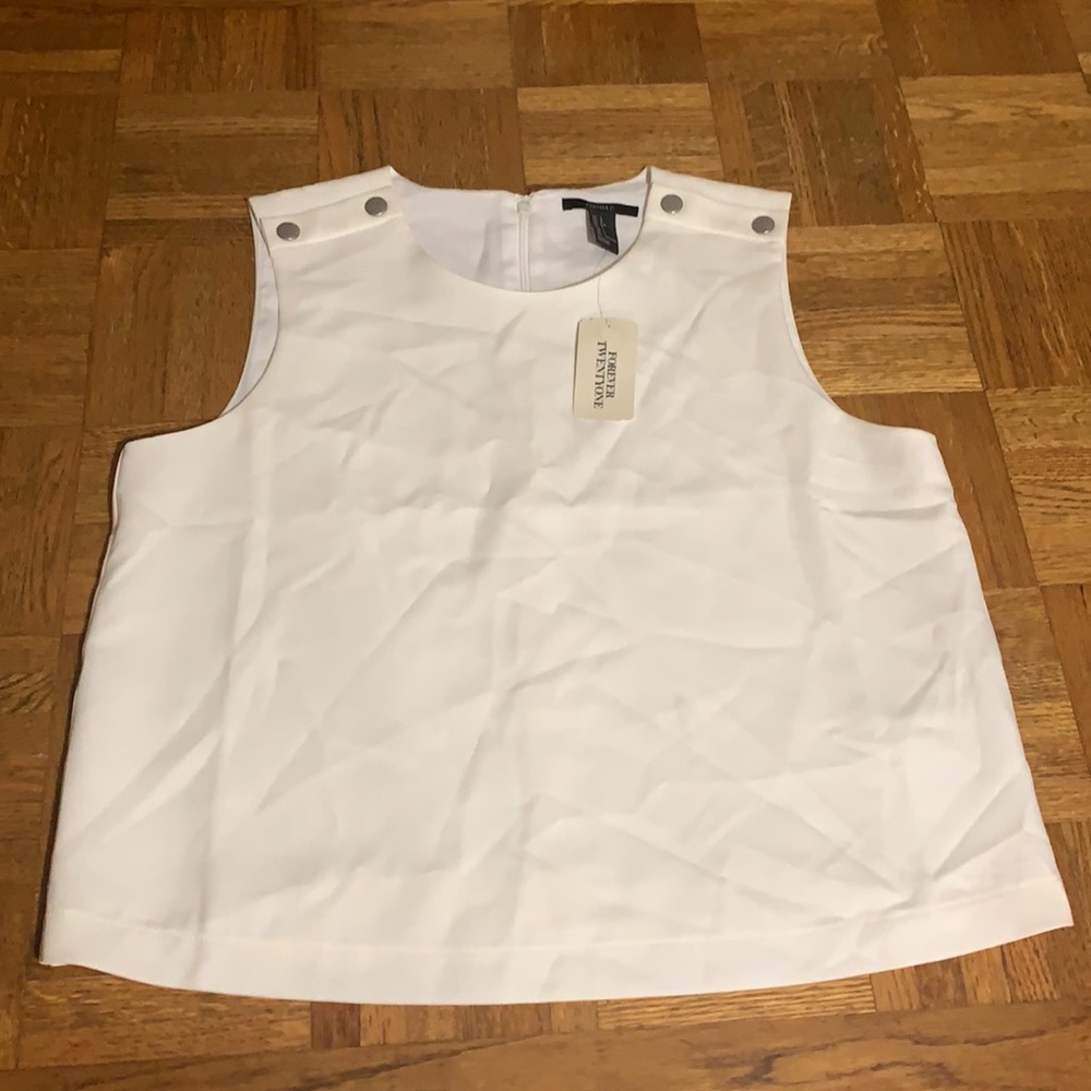 NWT Forever 21 White Sleeveless top with silver bottom details on shoulder